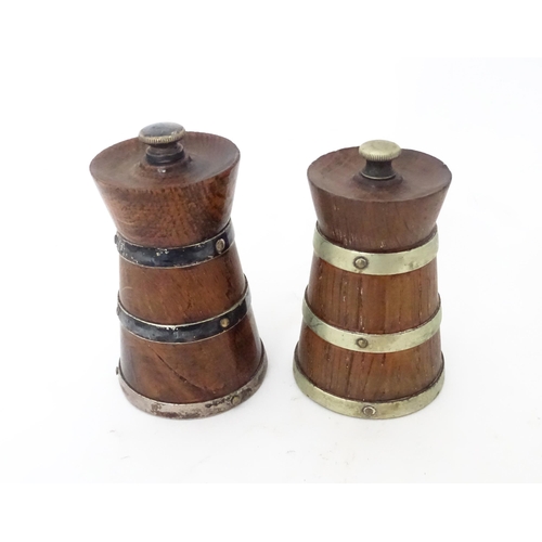 359 - A quantity of kitchenalia to include a strainer / skimmer, sugar crusher, salt and pepper grinders, ... 