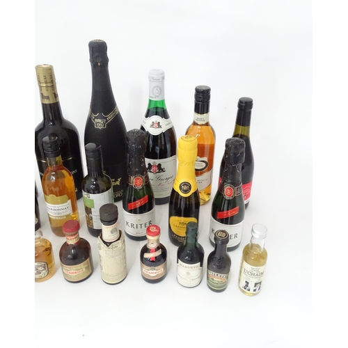 362 - A quantity of assorted alcohol and miniatures, to include a 70cl bottle of House of Commons sherry, ... 