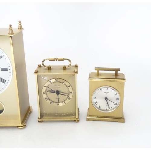 365 - A quantity of assorted quartz clocks to include carriage clock examples and a Lantern clock by Smith... 