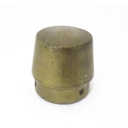 368 - Militaria : an early 20thC brass and lead weight, possibly a Trenchart paperweight, approx 3 1/4
