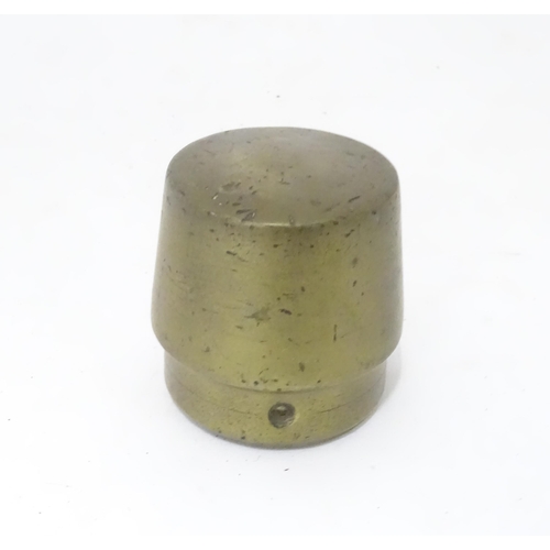 368 - Militaria : an early 20thC brass and lead weight, possibly a Trenchart paperweight, approx 3 1/4