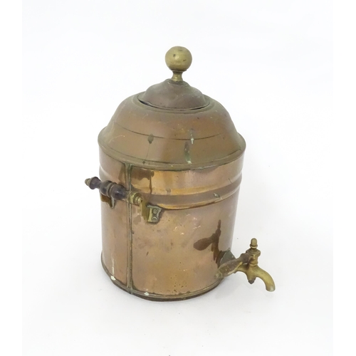 376 - A late 19th / early 20thC copper samovar of cylindrical form with twin handles. Approx. 14 3/4