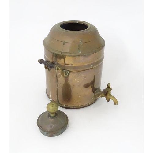 376 - A late 19th / early 20thC copper samovar of cylindrical form with twin handles. Approx. 14 3/4