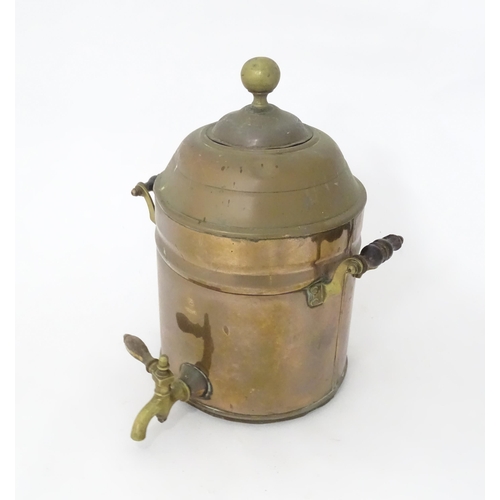376 - A late 19th / early 20thC copper samovar of cylindrical form with twin handles. Approx. 14 3/4