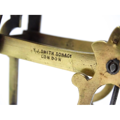 708 - Postal scales by T. J. Smith, Son & Co. of London. Together with associated weights, a stamp box, an... 