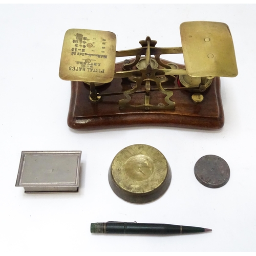 708 - Postal scales by T. J. Smith, Son & Co. of London. Together with associated weights, a stamp box, an... 