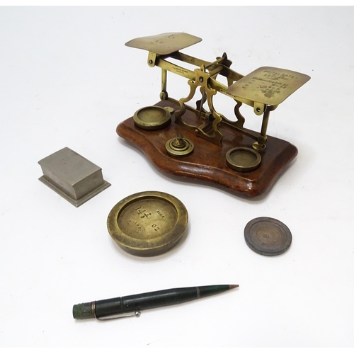 708 - Postal scales by T. J. Smith, Son & Co. of London. Together with associated weights, a stamp box, an... 