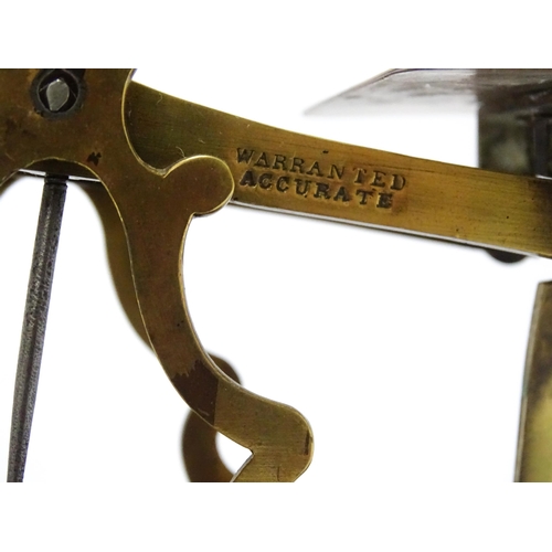 708 - Postal scales by T. J. Smith, Son & Co. of London. Together with associated weights, a stamp box, an... 