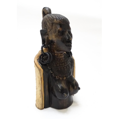 710 - Ethnographic / Native / Tribal : An African hardwood carving modelled as a woman with large hoop ear... 