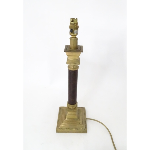 713 - A table lamp of Corinthian column form. Approx. 18 1/4
