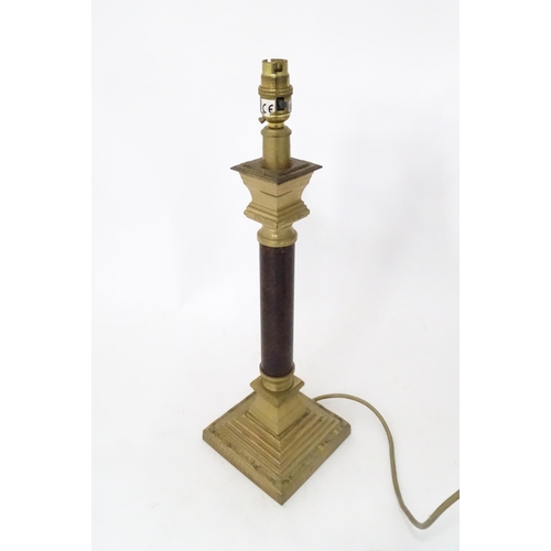 713 - A table lamp of Corinthian column form. Approx. 18 1/4