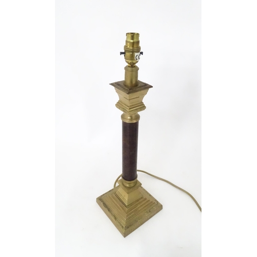 713 - A table lamp of Corinthian column form. Approx. 18 1/4