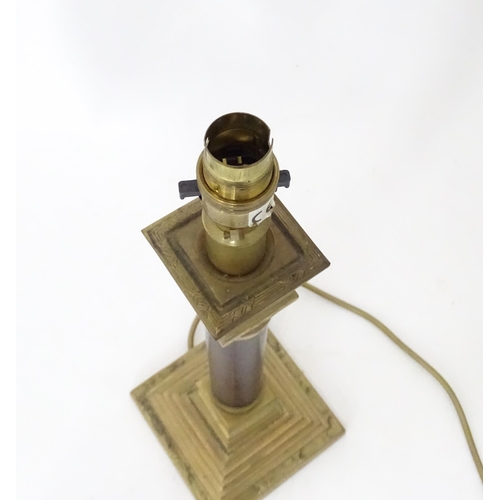 713 - A table lamp of Corinthian column form. Approx. 18 1/4