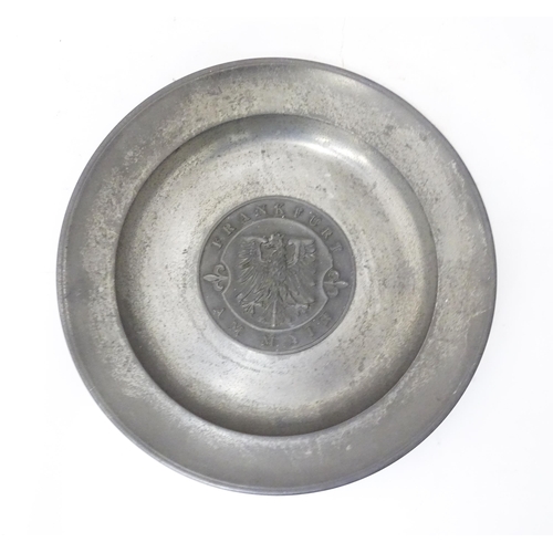 717 - A German pewter dish with central eagle motif Frankfurt Am Main. Marked to reverse Roders Soltauer Z... 
