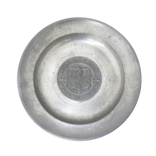 717 - A German pewter dish with central eagle motif Frankfurt Am Main. Marked to reverse Roders Soltauer Z... 