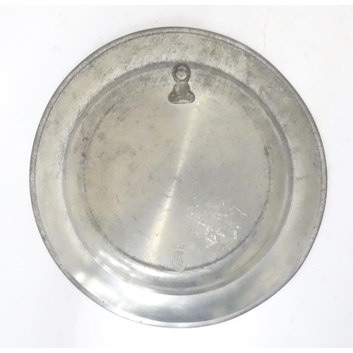 717 - A German pewter dish with central eagle motif Frankfurt Am Main. Marked to reverse Roders Soltauer Z... 