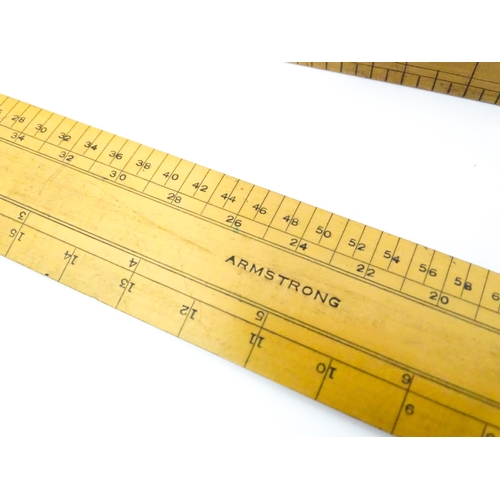 727 - A quantity of rules and rulers to include folding boxwood examples. Together with various magnifying... 