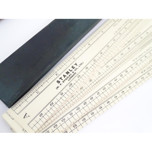 727 - A quantity of rules and rulers to include folding boxwood examples. Together with various magnifying... 