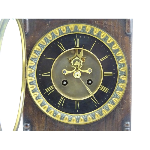 729 - An Edwardian wall clock, the stained oak case housing a black and gilt numeral dial with Brocot visi... 