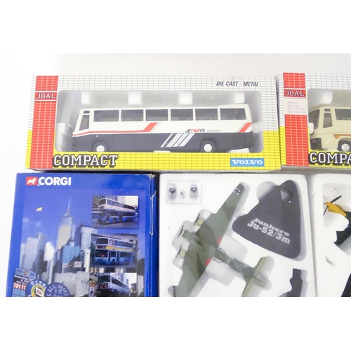 77 - Toys: A quantity of die cast scale model buses and plane models to include Corgi China Motor Bus, At... 