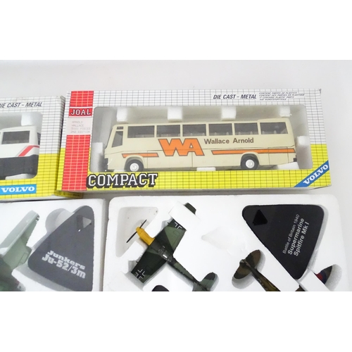 77 - Toys: A quantity of die cast scale model buses and plane models to include Corgi China Motor Bus, At... 