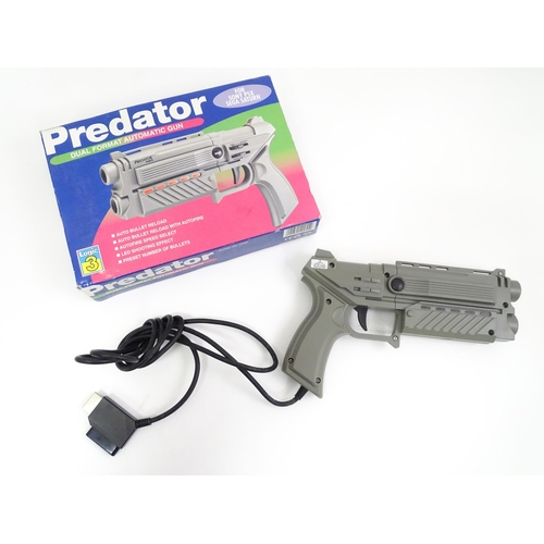 792 - Toys: A Sony PlayStation 1 (PS1 / PSX) video game console, with two controllers and a Predator dual ... 