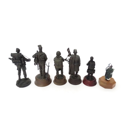 810 - A quantity of 20thC military figures to include a Reuge musical box modelled as a Piper of the Black... 