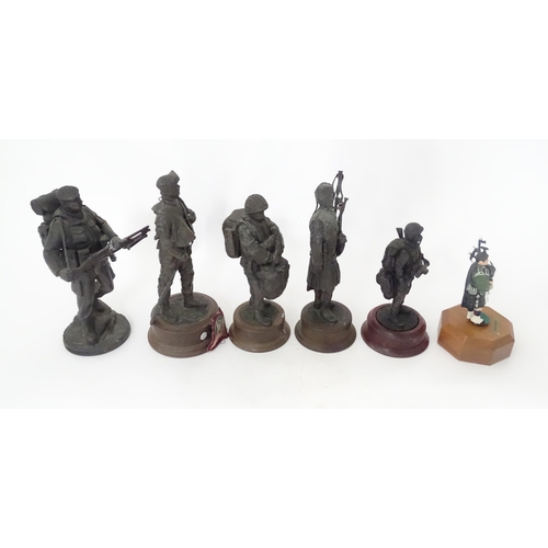 810 - A quantity of 20thC military figures to include a Reuge musical box modelled as a Piper of the Black... 