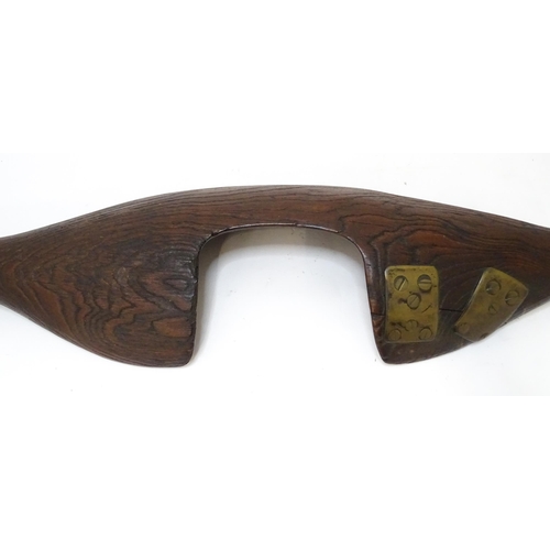 872 - A 19thC carved shoulder yoke, together with a late 19thC bow saw with a mahogany handle stamped '712... 