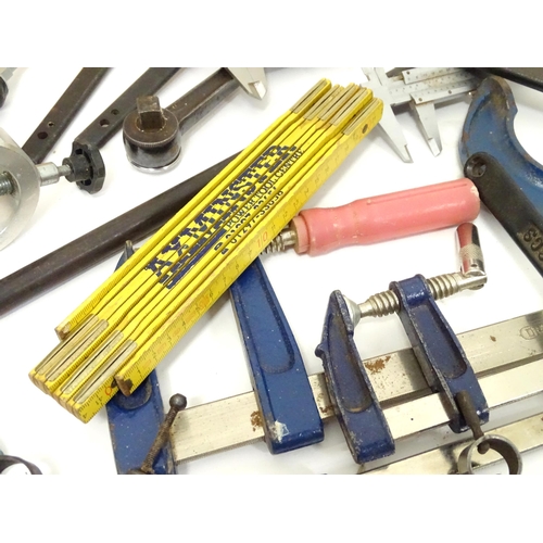 11 - A quantity of assorted hand tools , including spanners, callipers, vice, clamps, screwdrivers etc.