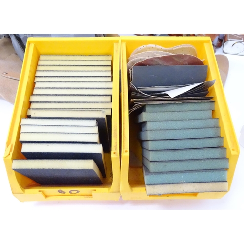 12 - A quantity of assorted carpentry / woodworking wood dyes, sanding blocks and sandpaper etc, together... 