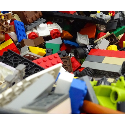 24 - A quantity of Lego to include bricks, wheels and figures etc.