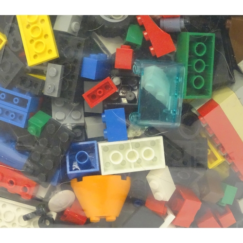 24 - A quantity of Lego to include bricks, wheels and figures etc.