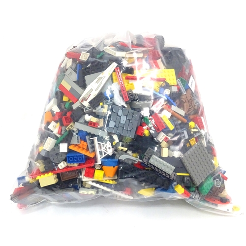 24 - A quantity of Lego to include bricks, wheels and figures etc.