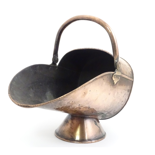 334 - An early 19thc copper coal scuttle, with swing handle and stamped '16' to the back, together with a ... 