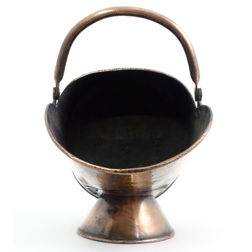 334 - An early 19thc copper coal scuttle, with swing handle and stamped '16' to the back, together with a ... 