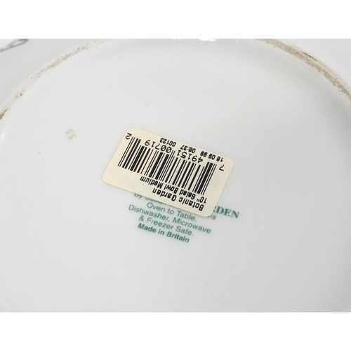 384 - Three items of Portmeirion decorated in the Botanic Garden patterns comprising a large bowl, smaller... 