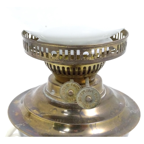 391 - A quantity of assorted table lamps, to include examples of oil lamp form, one formed as a Corinthian... 