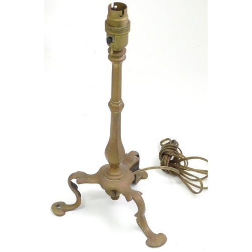 391 - A quantity of assorted table lamps, to include examples of oil lamp form, one formed as a Corinthian... 