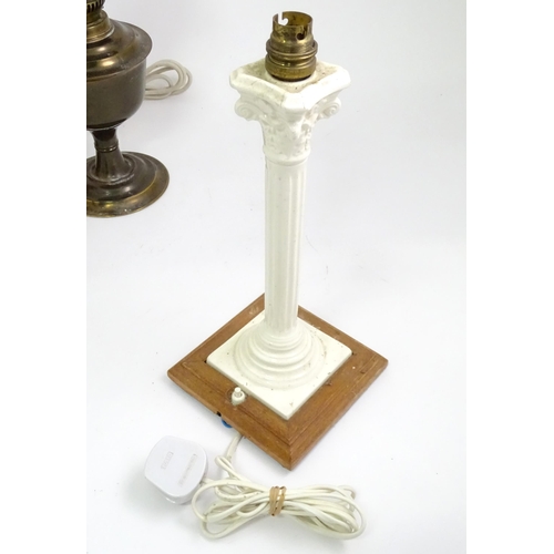 391 - A quantity of assorted table lamps, to include examples of oil lamp form, one formed as a Corinthian... 