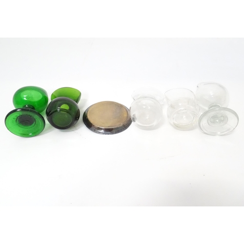 395 - A quantity of Victorian eyebaths to include green and clear glass examples. Together with a silver p... 