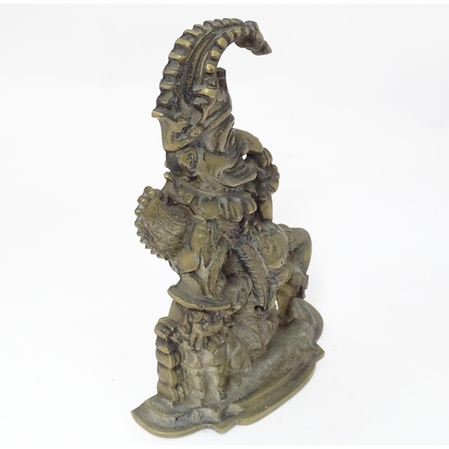 408 - A cast door stop / door porter modelled as Mr Punch and Toby the dog. Approx. 11 1/2