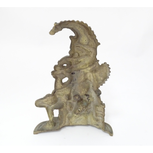 408 - A cast door stop / door porter modelled as Mr Punch and Toby the dog. Approx. 11 1/2