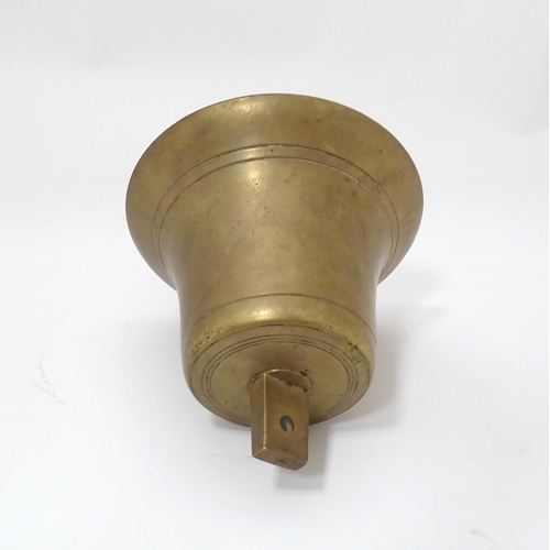 49 - A late 19thC brass hanging bell with leather strap, approx 5 1/2