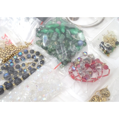 601 - A quantity of jewellery making accessories to include various fastenings / fittings together with as... 