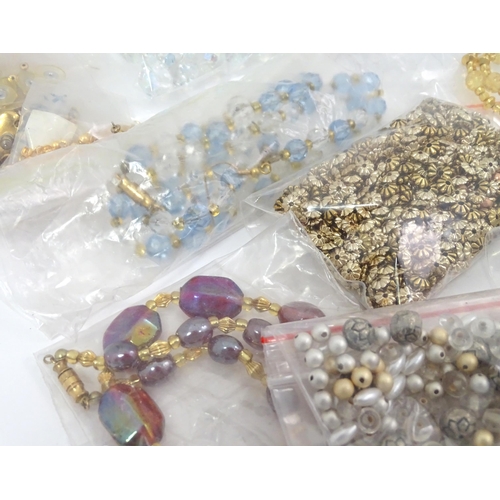 601 - A quantity of jewellery making accessories to include various fastenings / fittings together with as... 