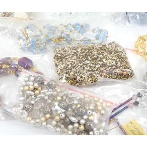 601 - A quantity of jewellery making accessories to include various fastenings / fittings together with as... 