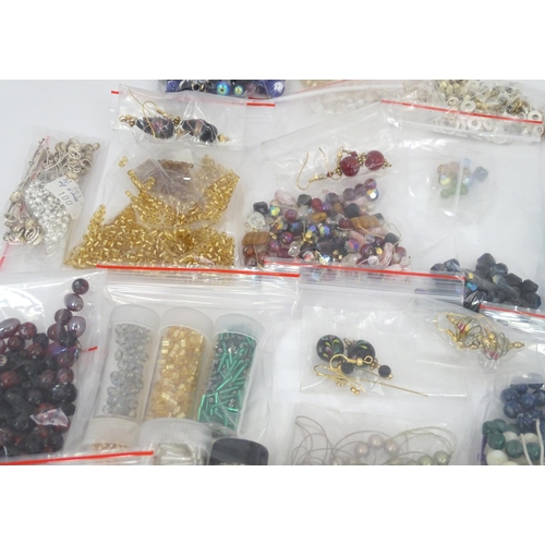 601 - A quantity of jewellery making accessories to include various fastenings / fittings together with as... 