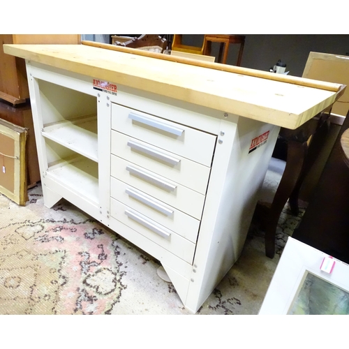 651 - Workshop Tools : An Axminster workbench, the metal base with two shelves and five drawers, approx 54... 
