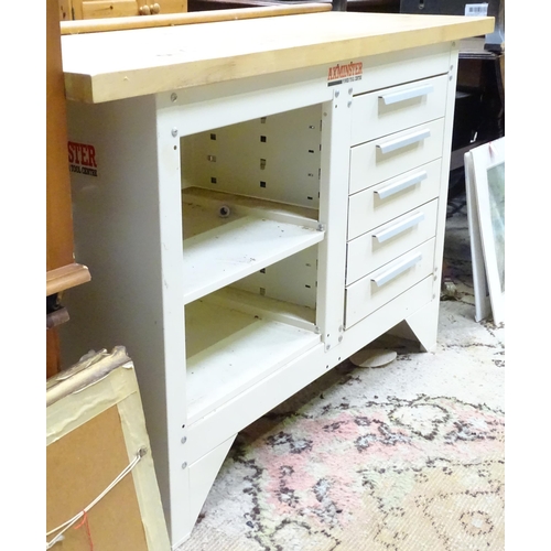 651 - Workshop Tools : An Axminster workbench, the metal base with two shelves and five drawers, approx 54... 